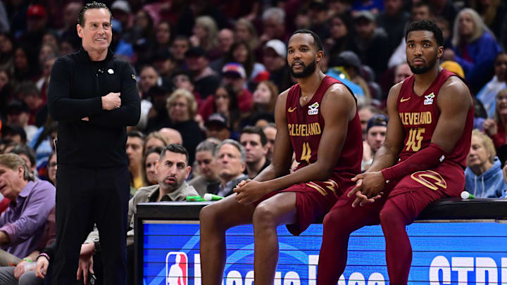 Apr 2, 2025; Cleveland, Ohio, USA;  Cleveland Cavaliers forward Evan Mobley (4) and guard Donovan Mitchell (45) wait along side head coach Kenny Atkinson to enter the game during the first half against the New York Knicks at Rocket Arena. Mandatory Credit: Ken Blaze-Imagn Images