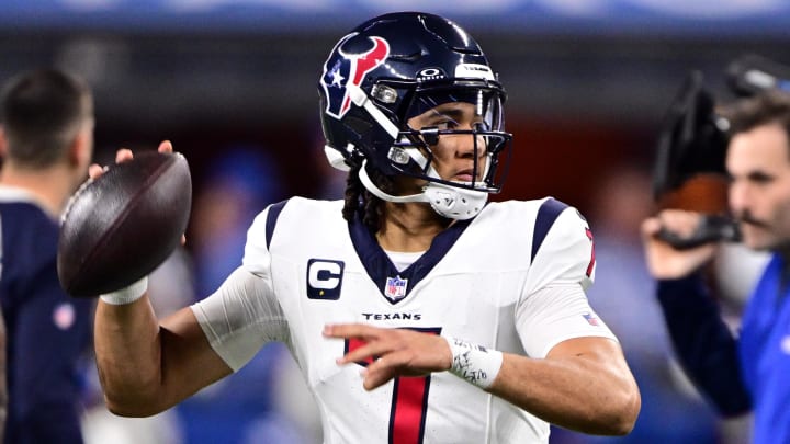 Jan 6, 2024; Indianapolis, Indiana, USA; Houston Texans quarterback C.J. Stroud (7) throws a pass to warm up before a game against the Indianapolis Colts at Lucas Oil Stadium. Mandatory Credit: Marc Lebryk-USA TODAY Sports