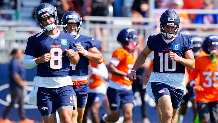 Denver Broncos quarterback Bo Nix (10) and quarterback Jarrett Stidham (8) warm up during training camp at Broncos Park. Denver Broncos quarterback Bo Nix (10) and quarterback Jarrett Stidham (8) warm up during training camp at Broncos Park.