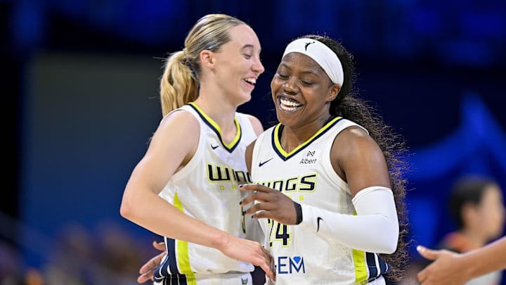 Jul 28, 2025; Arlington, Texas, USA; Dallas Wings guard Paige Bueckers (5) and guard Arike Ogunbowale (24) celebrate during the game between the Dallas Wings and the New York Liberty at College Park Center. Mandatory Credit: Jerome Miron-Imagn Images Jul 28, 2025; Arlington, Texas, USA; Dallas Wings guard Paige Bueckers (5) and guard Arike Ogunbowale (24) celebrate during the game between the Dallas Wings and the New York Liberty at College Park Center. Mandatory Credit: Jerome Miron-Imagn Images