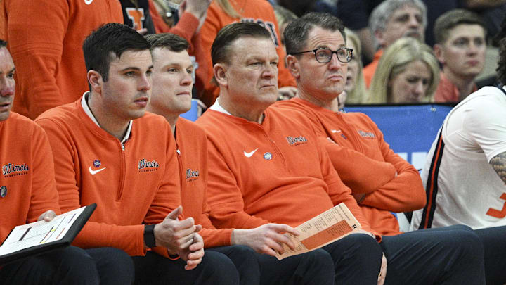 Mar 23, 2024; Omaha, NE, USA; Illinois Fighting Illini head coach Brad Underwood looks on during the second half against Duquesne Dukes in the second round of the 2024 NCAA Tournament at CHI Health Center Omaha. Mandatory Credit: Steven Branscombe-Imagn Images