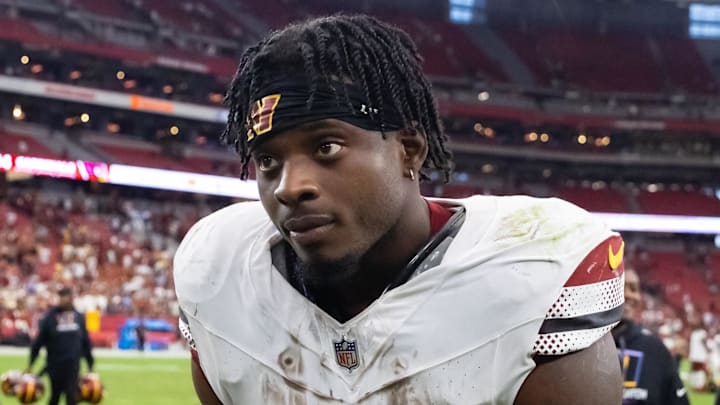 Sep 29, 2024; Glendale, Arizona, USA; Washington Commanders running back Brian Robinson Jr. (8) against the Arizona Cardinals at State Farm Stadium. Mandatory Credit: Mark J. Rebilas-Imagn Images Sep 29, 2024; Glendale, Arizona, USA; Washington Commanders running back Brian Robinson Jr. (8) against the Arizona Cardinals at State Farm Stadium. Mandatory Credit: Mark J. Rebilas-Imagn Images