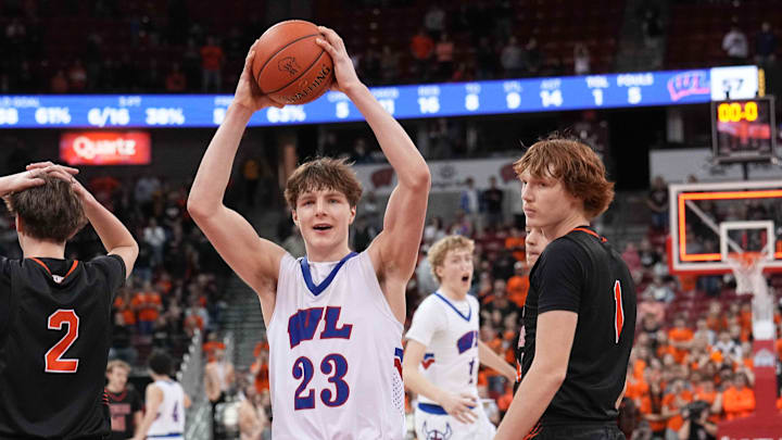 Wisconsin Lutheran's Zavier Zens (23) celebrates his team's 57-55 victory over Marshfield in the WIAA Division 1 state championship game, Saturday, March 22, 2025, at the Kohl Center in Madison, Wis.