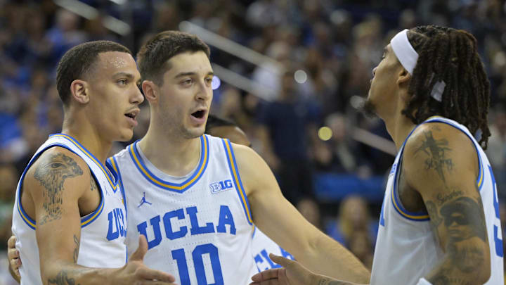 Feb 8, 2025; Los Angeles, California, USA; UCLA Bruins forward William Kyle III (24), guard Kobe Johnson (0), guard Lazar Stefanovic (10) and guard Skyy Clark (55) on the court after a basket in the second half against the Penn State Nittany Lions at Pauley Pavilion presented by Wescom. Mandatory Credit: Jayne Kamin-Oncea-Imagn Images Feb 8, 2025; Los Angeles, California, USA; UCLA Bruins forward William Kyle III (24), guard Kobe Johnson (0), guard Lazar Stefanovic (10) and guard Skyy Clark (55) on the court after a basket in the second half against the Penn State Nittany Lions at Pauley Pavilion presented by Wescom. Mandatory Credit: Jayne Kamin-Oncea-Imagn Images
