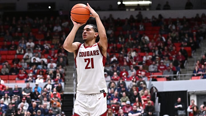 Jan 15, 2026; Pullman, Washington, USA; Washington State Cougars guard Ace Glass Lll (21) shoots a three-point basket against the Gonzaga Bulldogs in the first half at Friel Court at Beasley Coliseum. Mandatory Credit: James Snook-Imagn Images
