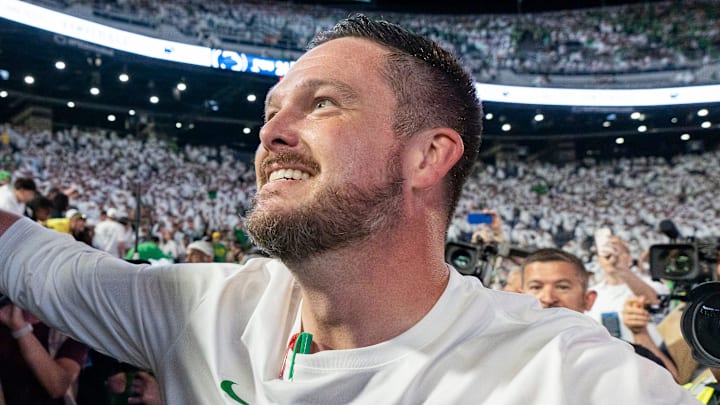 Oregon head coach Dan Lanning celebrates his win with Duck fans as the Oregon Ducks face the Penn State Nittany Lions on Sept. 27, 2025, at Beaver Stadium in University Park, Pennsylvania.