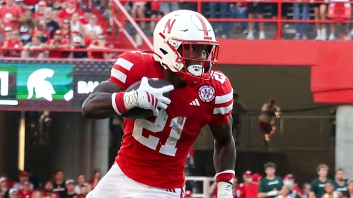 Nebraska running back Emmett Johnson carries the ball vs. Michigan State on Oct. 4, 2025.