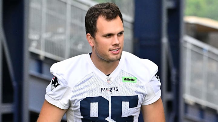 Jun 9, 2025; Foxborough, MA, USA; New England Patriots tight end Hunter Henry (85) and running back Trayveon Williams (49) walk to the practice fields at Gillette Stadium. Mandatory Credit: Eric Canha-Imagn Images