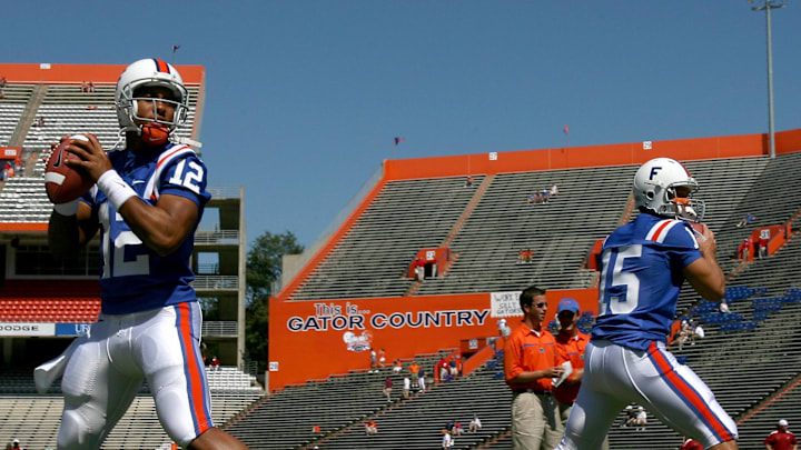 Sep 30, 2006; Gainesville, FL, USA; Florida Gators quarterbacks (15) Tim Tebow and (12) Chris Leak warm up before a game against the Alabama Crimson Tide at Ben Hill Griffin Stadium in Gainesville, FL. Mandatory Credit: Jason Parkhurst-Imagn Images Copyright © (2006) Jason Parkhurst Sep 30, 2006; Gainesville, FL, USA; Florida Gators quarterbacks (15) Tim Tebow and (12) Chris Leak warm up before a game against the Alabama Crimson Tide at Ben Hill Griffin Stadium in Gainesville, FL. Mandatory Credit: Jason Parkhurst-Imagn Images Copyright © (2006) Jason Parkhurst