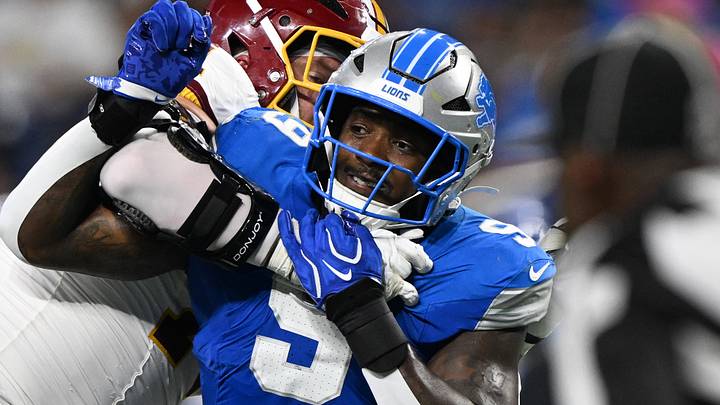 Detroit Lions defensive end Derrick Moore (9) tries to pressure the quarterback against the Washington Commanders Detroit Lions defensive end Derrick Moore (9) tries to pressure the quarterback against the Washington Commanders