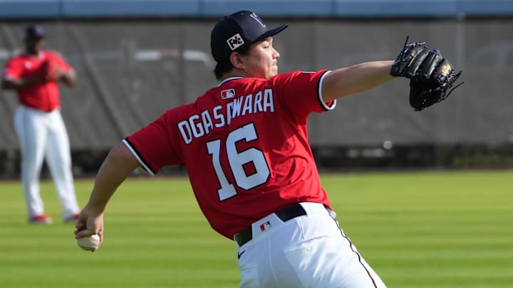 Feb 15, 2025; West Palm Beach, FL, USA; Washington Nationals pitcher Shinnosuke Ogasawara (16) warms up before Spring Training activities