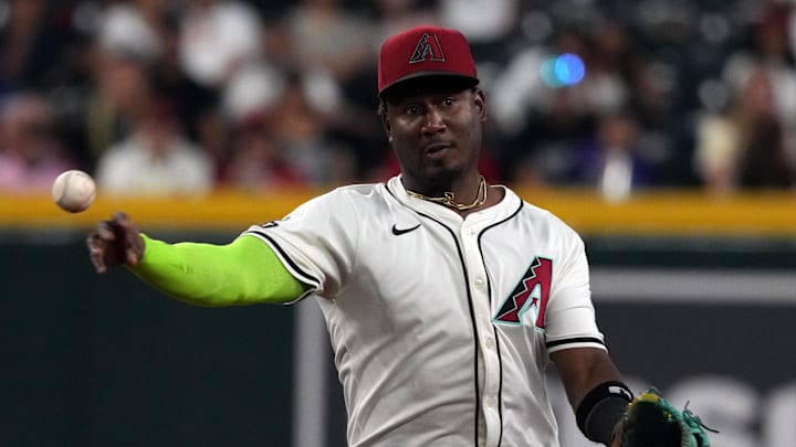 Jul 6, 2025; Phoenix, Arizona, USA; Arizona Diamondbacks shortstop Geraldo Perdomo (2) makes the play for an out against the Kansas City Royals in the third inning at Chase Field. Mandatory Credit: Rick Scuteri-Imagn Images Jul 6, 2025; Phoenix, Arizona, USA; Arizona Diamondbacks shortstop Geraldo Perdomo (2) makes the play for an out against the Kansas City Royals in the third inning at Chase Field. Mandatory Credit: Rick Scuteri-Imagn Images