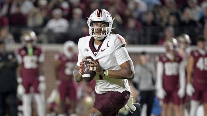 Nov 15, 2025; Tallahassee, Florida, USA; Virginia Tech Hokies quarterback Kyron Drones (1) looks to pass during the second half against the Florida State Seminoles at Doak S. Campbell Stadium. Mandatory Credit: Melina Myers-Imagn Images Nov 15, 2025; Tallahassee, Florida, USA; Virginia Tech Hokies quarterback Kyron Drones (1) looks to pass during the second half against the Florida State Seminoles at Doak S. Campbell Stadium. Mandatory Credit: Melina Myers-Imagn Images