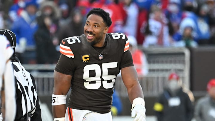Dec 21, 2025; Cleveland, Ohio, USA;  Cleveland Browns defensive end Myles Garrett (95) reacts  after a penalty was not called on a play were his helmet was ripped off by Buffalo Bills offensive tackle Dion Dawkins (73) during the second half at Huntington Bank Field. Mandatory Credit: Ken Blaze-Imagn Images