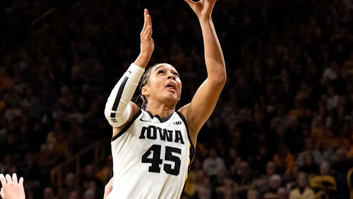 Iowa forward Hannah Stuelke (45) shoots the basketball against the Illinois Fighting Illini Feb. 26, 2026 at Carver-Hawkeye Arena in Iowa City, Iowa.