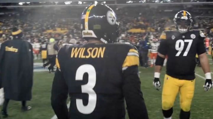 Pittsburgh Steelers QB Russell Wilson walks toward Cam Heyward after team's loss to Bengals on Jan. 4, 2025.