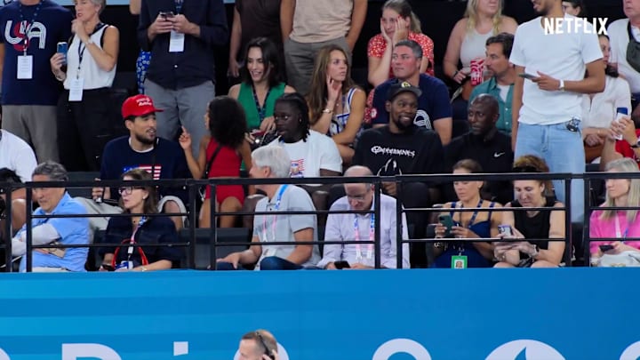 Team USA basketball stars spectate in the stands at the 2024 Summer Olympics.