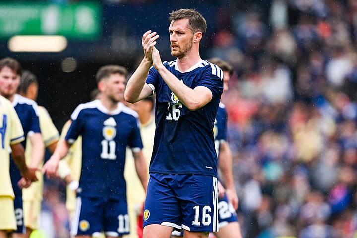 Dom Hyam claps towards the supporters at the final whistle during an International Friendly between Scotland and Curacao.