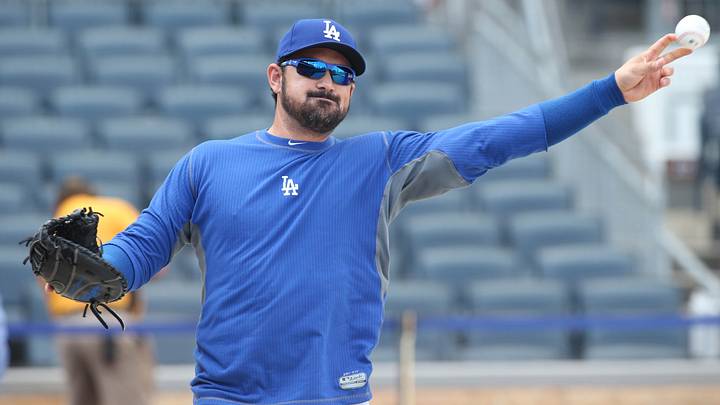 Los Angeles Dodgers first baseman Adrian Gonzalez (23) warms up Los Angeles Dodgers first baseman Adrian Gonzalez (23) warms up