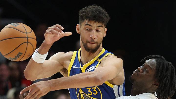Oct 7, 2026; Portland, Oregon, USA;  Portland Trail Blazers guard Sidy Cissoko (91) defends Golden State Warriors forward Malevy Leons (33) during the second half at Moda Center.  Mandatory Credit: Jaime Valdez-Imagn Images