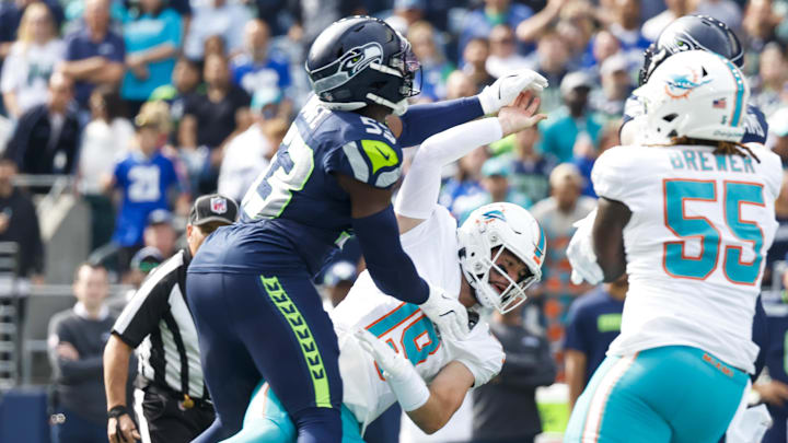 Sep 22, 2024; Seattle, Washington, USA; Seattle Seahawks linebacker Boye Mafe (53) pressures Miami Dolphins quarterback Skylar Thompson (19) during the first quarter at Lumen Field.