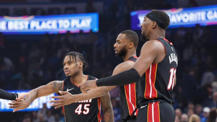 The Miami Heat's Tyler Herro (left), Davion Mitchell (45), Andrew Wiggins (center right) and Bam Adebayo (right). The Miami Heat's Tyler Herro (left), Davion Mitchell (45), Andrew Wiggins (center right) and Bam Adebayo (right).