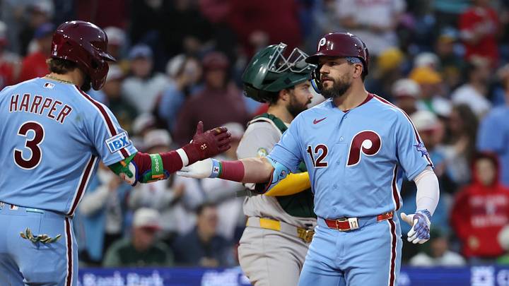 May 7, 2026; Philadelphia, Pennsylvania, USA; Philadelphia Phillies left fielder Kyle Schwarber (12) is congratulated by first baseman Bryce Harper (3) after hitting a home run against the Athletics at Citizens Bank Park.