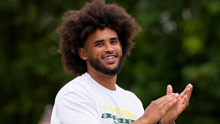 Oregon quarterback Dante Moore celebrates after a reception during a youth football camp at Marist Catholic High School on June 20, 2026, in Eugene, Oregon. Oregon quarterback Dante Moore celebrates after a reception during a youth football camp at Marist Catholic High School on June 20, 2026, in Eugene, Oregon.