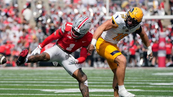 Ohio State Buckeyes safety Earl Little Jr. (1) knocks the ball away from Kent State Golden Flashes tight end Hunter Hopperton (18) in the second quarter of the NCAA football game at Ohio Stadium on Sept. 19, 2026.