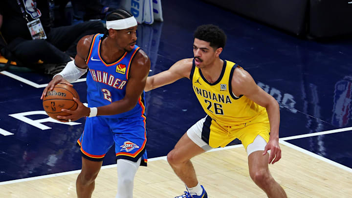 Jun 11, 2025; Indianapolis, Indiana, USA; Oklahoma City Thunder guard Shai Gilgeous-Alexander (2) handles the ball against Indiana Pacers guard Ben Sheppard (26) during the second quarter in game three of the 2025 NBA Finals at Gainbridge Fieldhouse. Mandatory Credit: Trevor Ruszkowski-Imagn Images