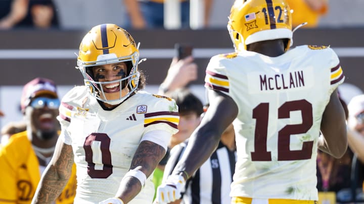 Oct 18, 2025; Tempe, Arizona, USA; Arizona State Sun Devils wide receiver Jordyn Tyson (0) celebrates a touchdown with teammate Malik McClain (12) against the Texas Tech Red Raiders in the second half at Mountain America Stadium. Mandatory Credit: Mark J. Rebilas-Imagn Images Oct 18, 2025; Tempe, Arizona, USA; Arizona State Sun Devils wide receiver Jordyn Tyson (0) celebrates a touchdown with teammate Malik McClain (12) against the Texas Tech Red Raiders in the second half at Mountain America Stadium. Mandatory Credit: Mark J. Rebilas-Imagn Images