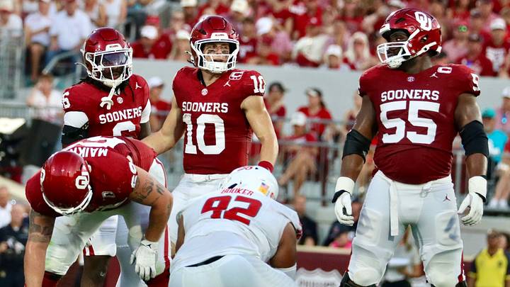 Oklahoma quarterback John Mateer looks to the sideline before a snap in the first half against New Mexico. Oklahoma quarterback John Mateer looks to the sideline before a snap in the first half against New Mexico.