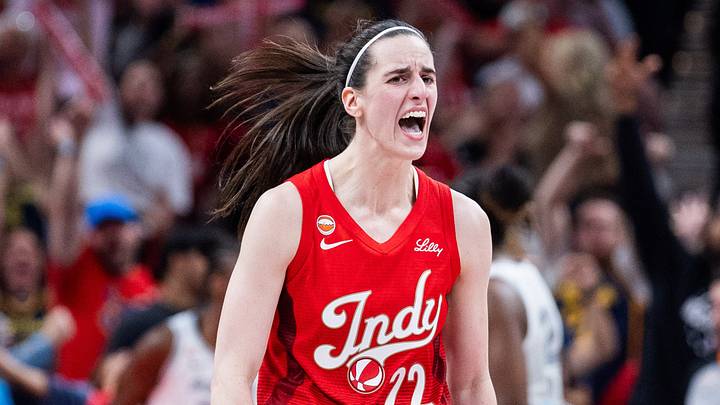Aug 6, 2026; Indianapolis, Indiana, USA;  Indiana Fever guard Caitlin Clark (22) reacts after making a basket against the Las Vegas Aces during the second half at Gainbridge Fieldhouse. Mandatory Credit: Trevor Ruszkowski-Imagn Images