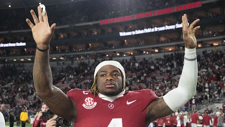 Nov 30, 2024; Tuscaloosa, Alabama, USA;  Alabama Crimson Tide quarterback Jalen Milroe (4) celebrates after defeating the Auburn Tigers at Bryant-Denny Stadium. Alabama won 28-14.