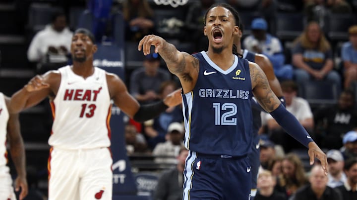 Oct 24, 2025; Memphis, Tennessee, USA; Memphis Grizzlies guard Ja Morant (12) reacts during the first quarter against the Miami Heat at FedExForum. Mandatory Credit: Petre Thomas-Imagn Images