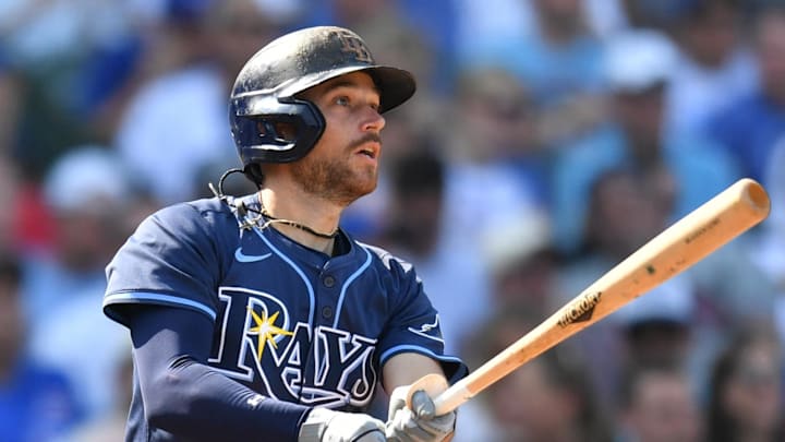 Sep 13, 2025; Chicago, Illinois, USA; Tampa Bay Rays second baseman Brandon Lowe (8) hits an RBI single against the Chicago Cubs during the sixth inning at Wrigley Field. Mandatory Credit: Patrick Gorski-Imagn Images