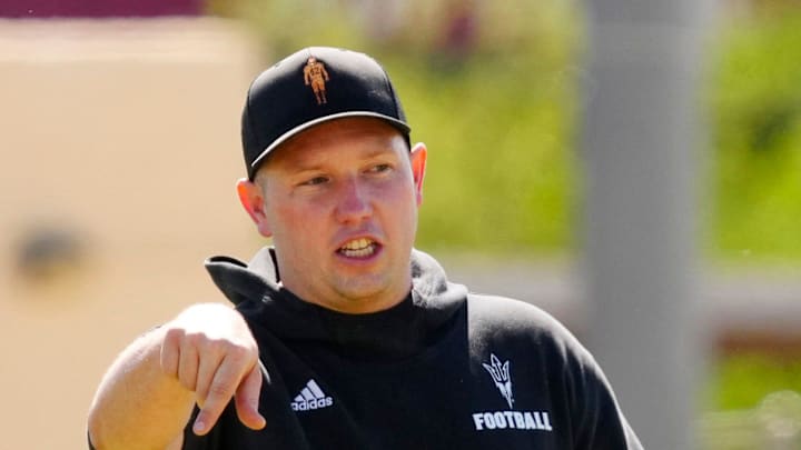 Arizona State head coach Kenny Dillingham watches his team as they run drills during a spring practice at Kajikawa practice fields in Tempe, Ariz. on April 14, 2026.