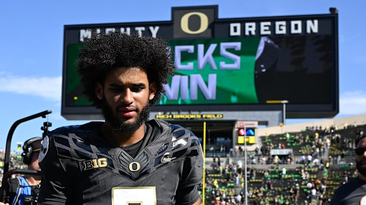 Sep 20, 2025; Eugene, Oregon, USA; Oregon Ducks quarterback Dante Moore (5) walks off the field after the game against the Oregon State Beavers at Autzen Stadium. Mandatory Credit: Troy Wayrynen-Imagn Images