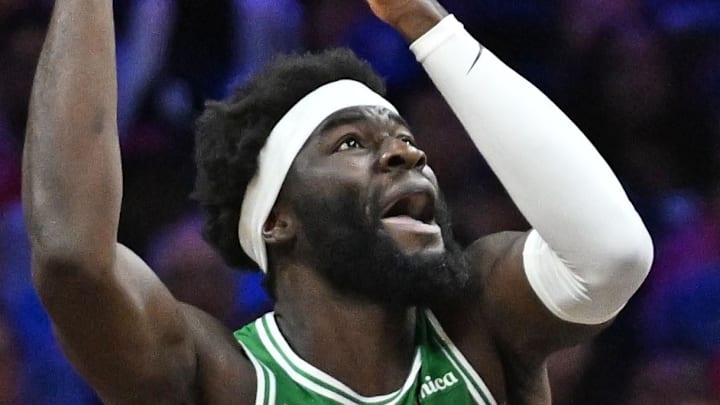 Apr 24, 2026; Philadelphia, Pennsylvania, USA; Boston Celtics center Neemias Queta (88) is defended by Philadelphia 76ers guard Vj Edgecombe (77) and guard Kelly Oubre Jr. (9) during the second half at Xfinity Mobile Arena. Mandatory Credit: Eric Hartline-Imagn Images