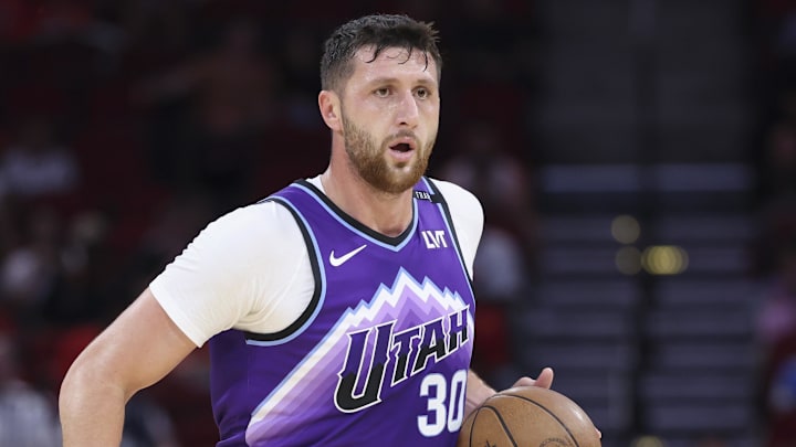 Oct 8, 2025; Houston, Texas, USA; Utah Jazz center Jusuf Nurkic (30) controls the ball as Houston Rockets center Alperen Sengun (28) defends during the first quarter at Toyota Center. Mandatory Credit: Troy Taormina-Imagn Images