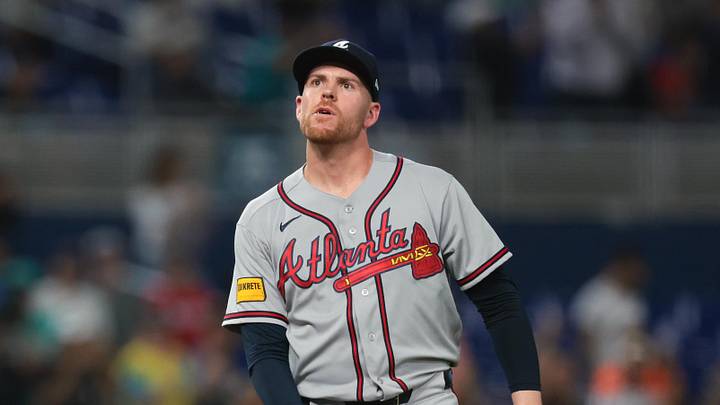 May 18, 2026; Miami, Florida, USA; Atlanta Braves pitcher Aaron Bummer (49) reacts after allowing a son home run against Miami Marlins second baseman Xavier Edwards (9) during the fifth inning at loanDepot Park. Mandatory Credit: Sam Navarro-Imagn Images