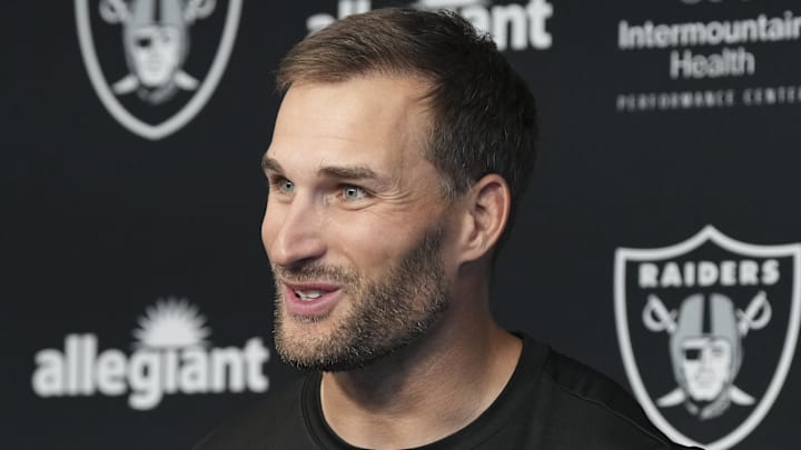 Las Vegas Raiders quarterback Kirk Cousins speaks at a press conference.