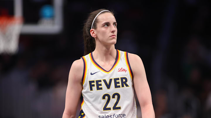 May 22, 2025; Atlanta, Georgia, USA; Indiana Fever guard Caitlin Clark (22) in action against the Atlanta Dream in the first half at State Farm Arena. Mandatory Credit: Brett Davis-Imagn Images