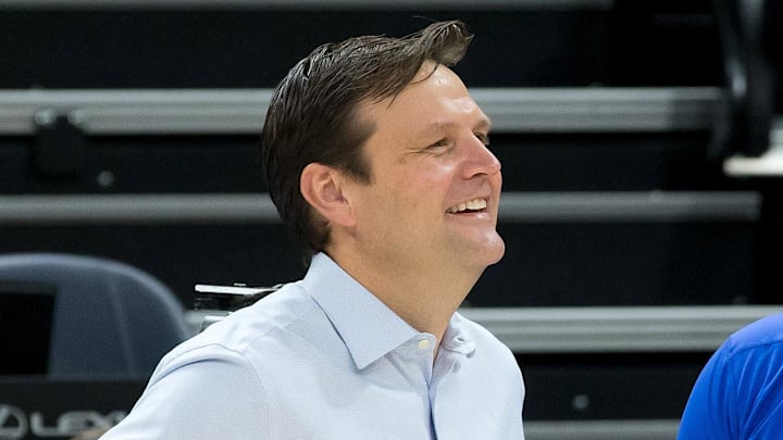 Oct 30, 2017; Salt Lake City, UT, USA; Utah Jazz general manager Dennis Lindsey (left) talks with Dallas Mavericks assistant coach Melvin Hunt (right) prior to a game at Vivint Smart Home Arena. Mandatory Credit: Russ Isabella-Imagn Images