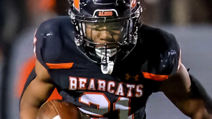 Aledo senior running back Kaden Winkfield ran for 90 yards on 13 carries and scored two touchdowns to help lead the Bearcats to victory over Denton Guyer in Friday's 2025 season opener.