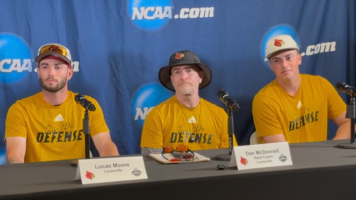 Louisville baseball outfielder Lucas Moore, head coach Dan McDonnell and right-handed pitcher Patrick Forbes