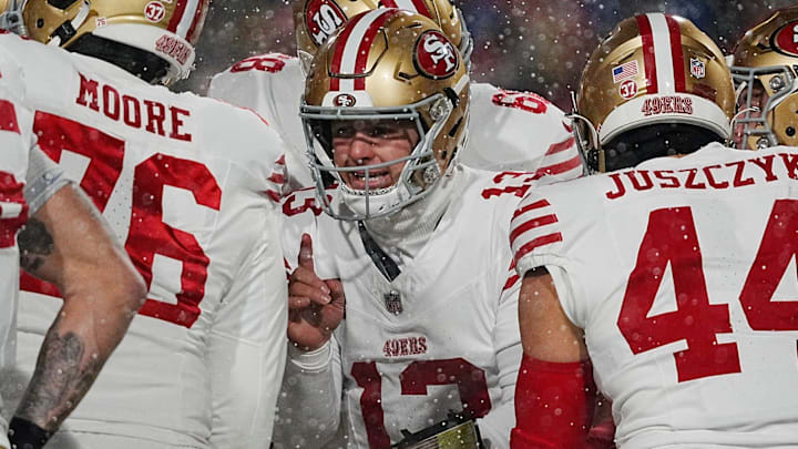 49ers quarterback Brock Purdy relays the play in the huddle during first half action of their home game against the San Francisco 49ers in Orchard Park on Dec. 1, 2024.