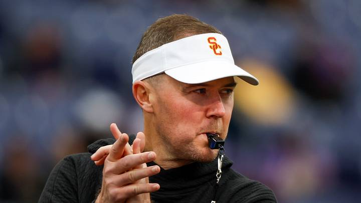 Nov 2, 2024; Seattle, Washington, USA; USC Trojans head coach Lincoln Riley watches pregame warmups against the Washington Huskies at Alaska Airlines Field at Husky Stadium. Mandatory Credit: Joe Nicholson-Imagn Images