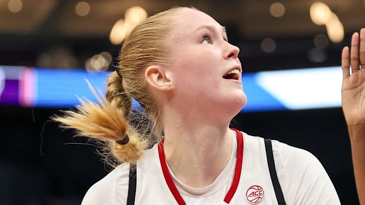 Nov 9, 2025; Charlotte, North Carolina, USA; NC State Wolfpack forward Tilda Trygger (18) looks to the basket against the Southern California Trojans during the second quarter of the Ally Tipoff game at Spectrum Center. Mandatory Credit: Cory Knowlton-Imagn Images