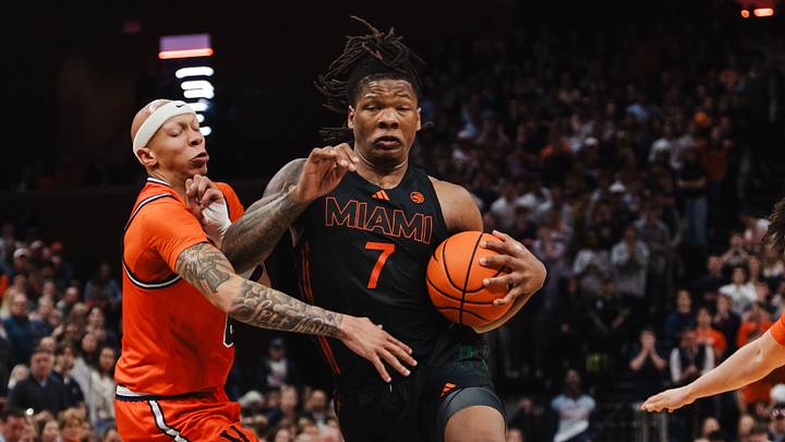 Feb 21, 2026; Charlottesville, Virginia, USA; Miami (FL) Hurricanes forward Shelton Henderson (7) controls the ball while Virginia Cavaliers guard Jacari White (6) defends during the first half at John Paul Jones Arena. Mandatory Credit: Emily Faith Morgan-Imagn Images Feb 21, 2026; Charlottesville, Virginia, USA; Miami (FL) Hurricanes forward Shelton Henderson (7) controls the ball while Virginia Cavaliers guard Jacari White (6) defends during the first half at John Paul Jones Arena. Mandatory Credit: Emily Faith Morgan-Imagn Images